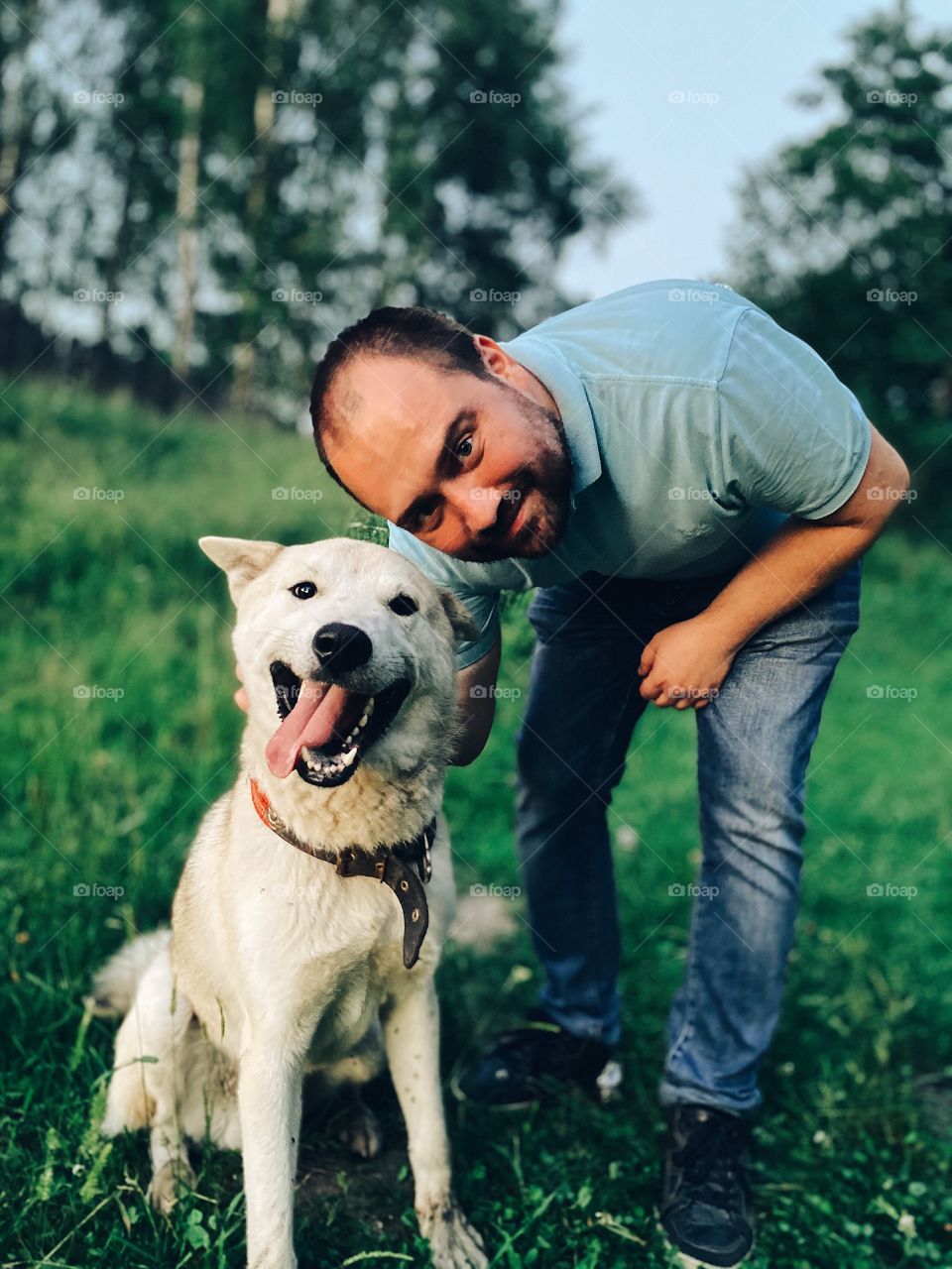 Man and cute dog portrait