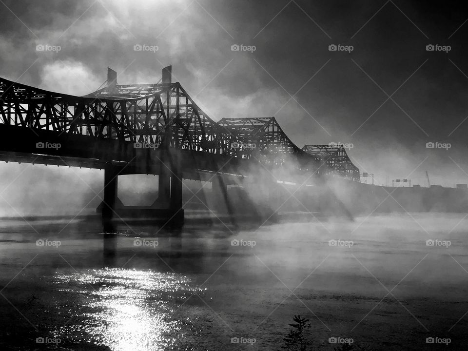 Black and White fog on the Ohio River during sunrise.