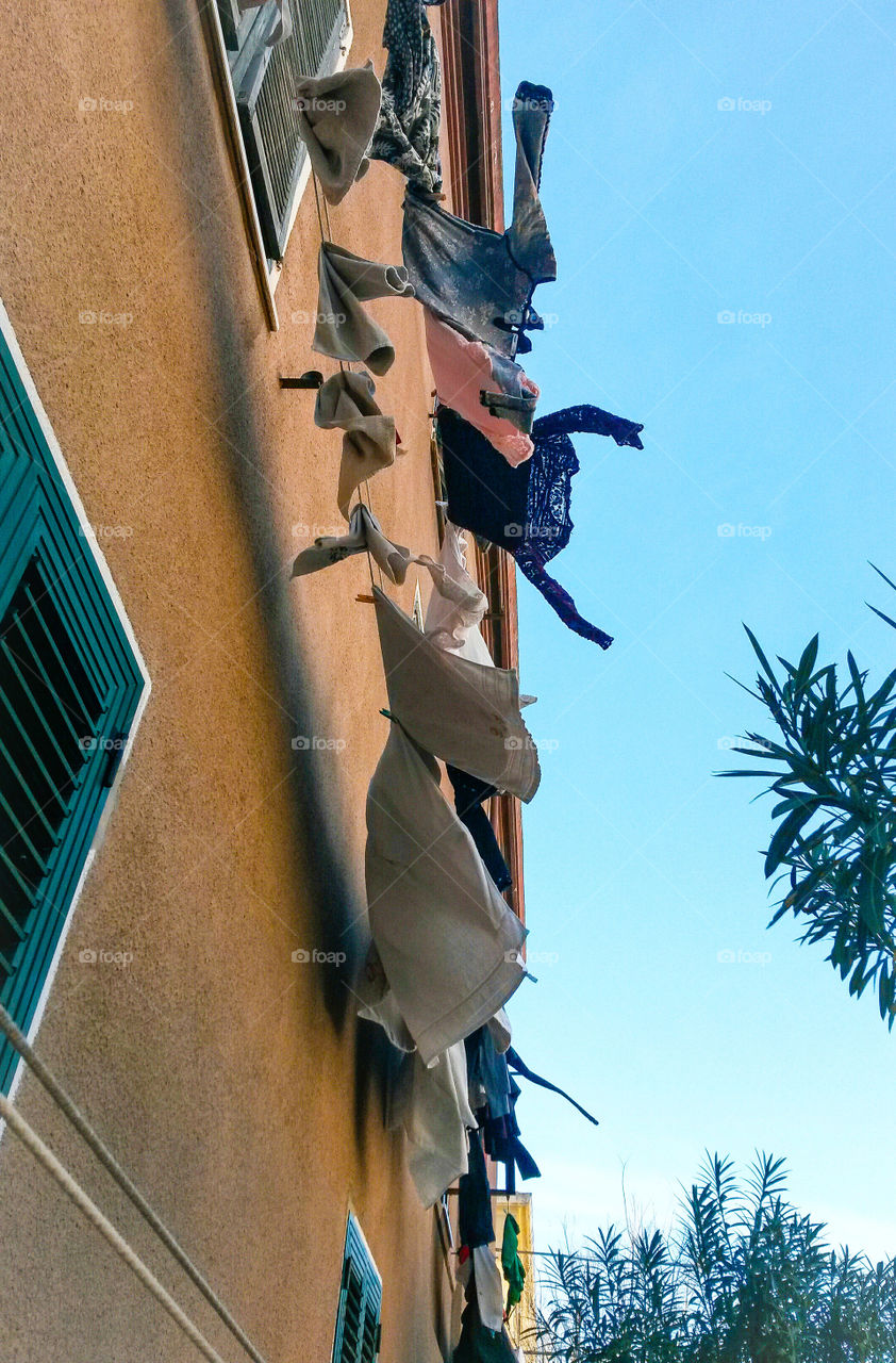 Low angle view of clothes hanging on clothesline