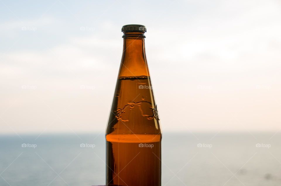 A bottle of beer. Cold drinks. Background