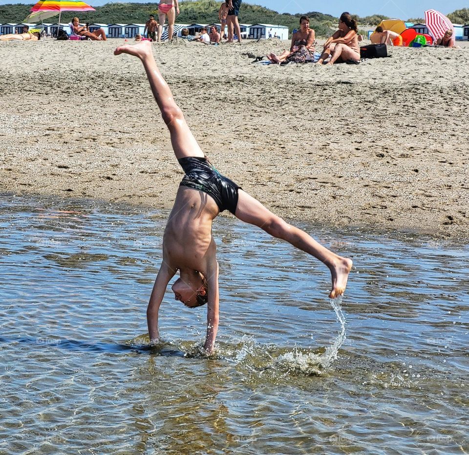 Acrobatic on the beach