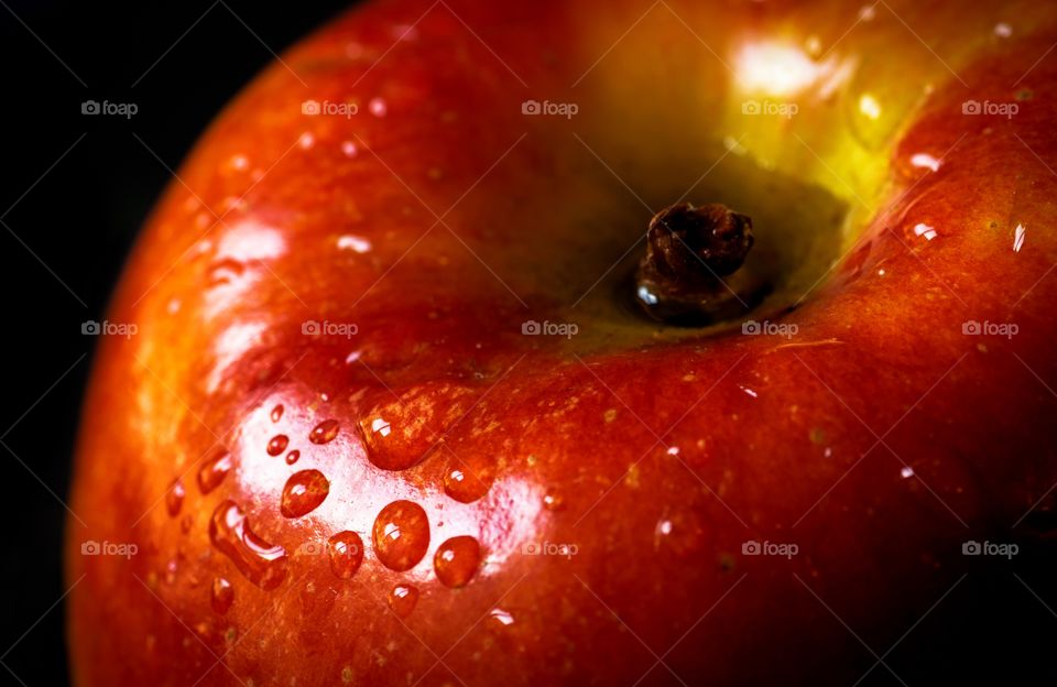 Close-up of waterdrop on apple