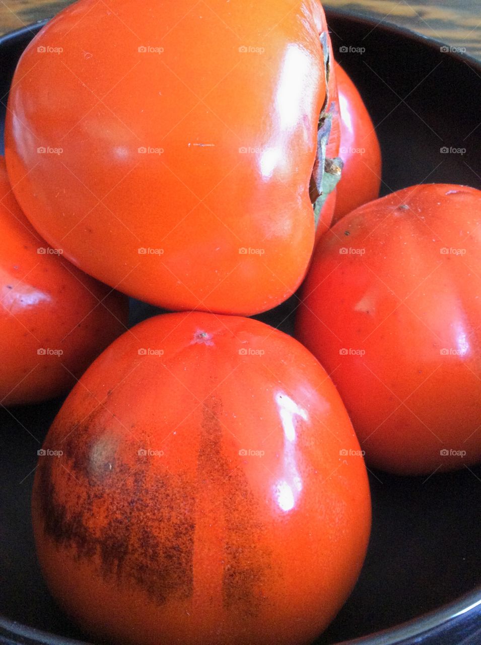 Bowl of persimmons