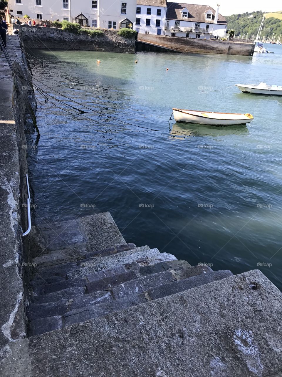 A landing station or jetty in a gloriously sunny day in Dartmouth.