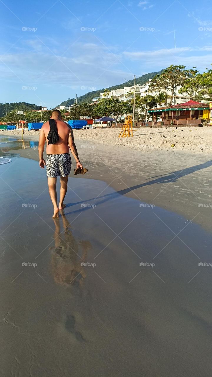 Lonely man on the beach