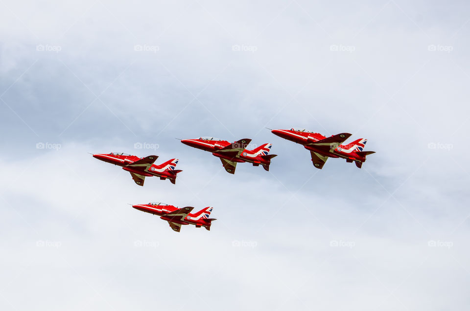 The red arrows in formation