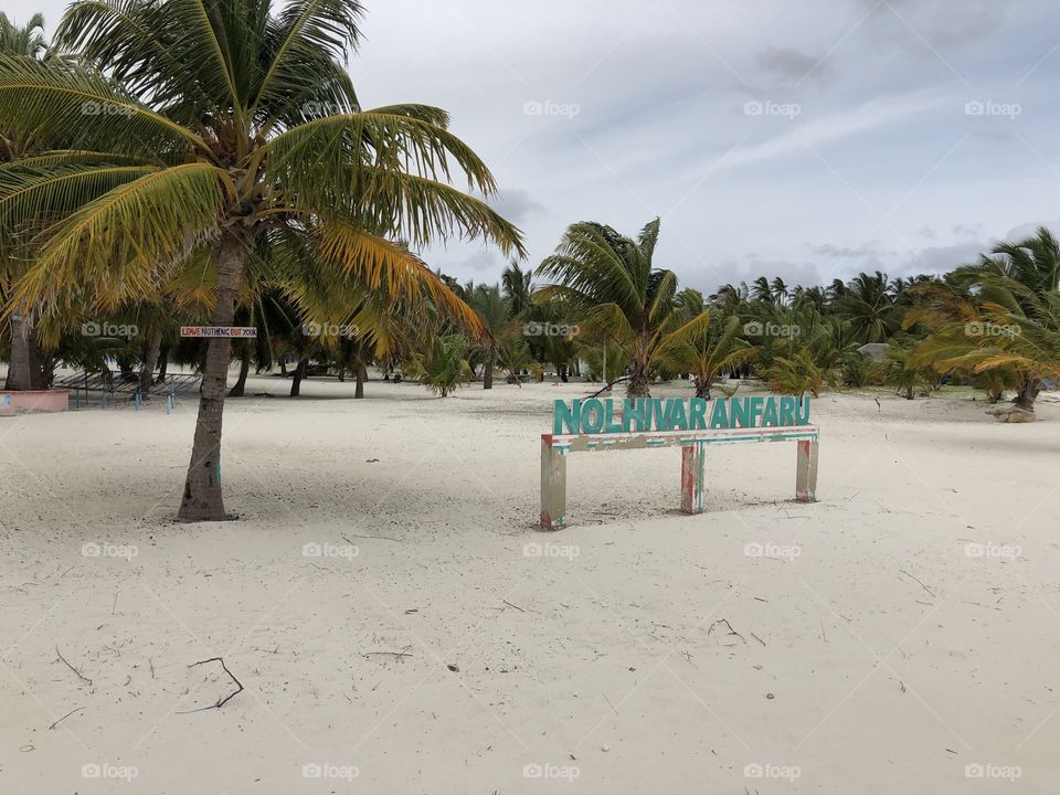 The image of a flawless beach is one that often includes white sand — and palm trees, clear water, and blue skies, of course. One of the beautiful inhabited island #HDH nolhivaramfaru.