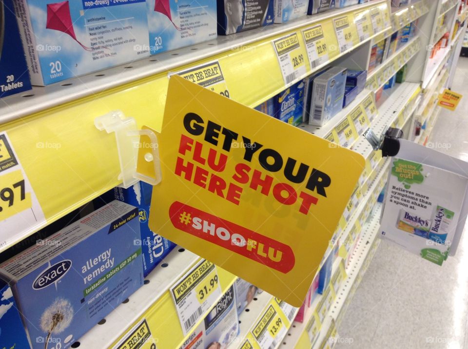 "Get your flu shot here" sign