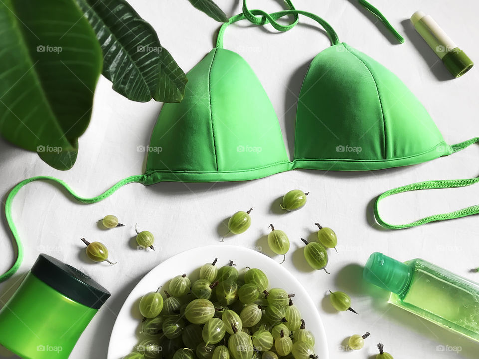 Green summer flat lay items 