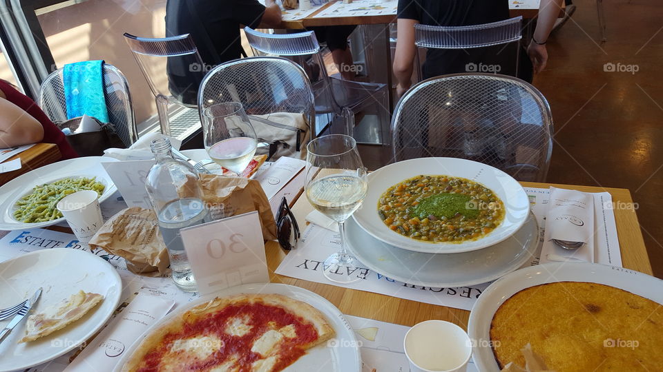 Italian dishes: minestrone, pizza napoletana and trofie al pesto
