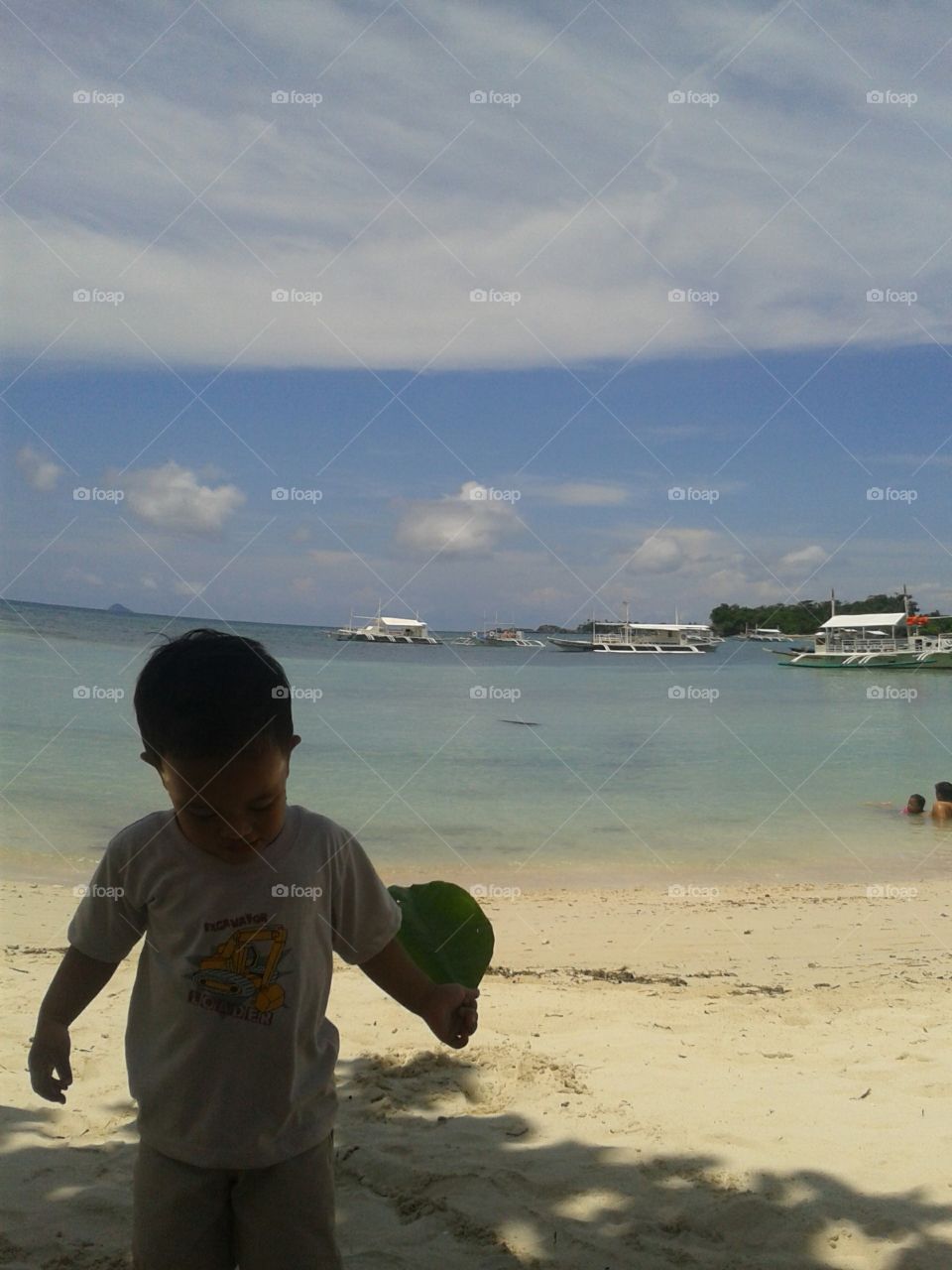 island hopping at Daanbantayan Cebu City Philippines. my little boy hes first time at the beach.