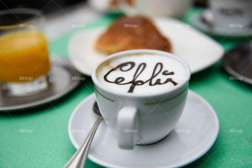 a cup of coffee at a cafe in Cefalu in Sicily.