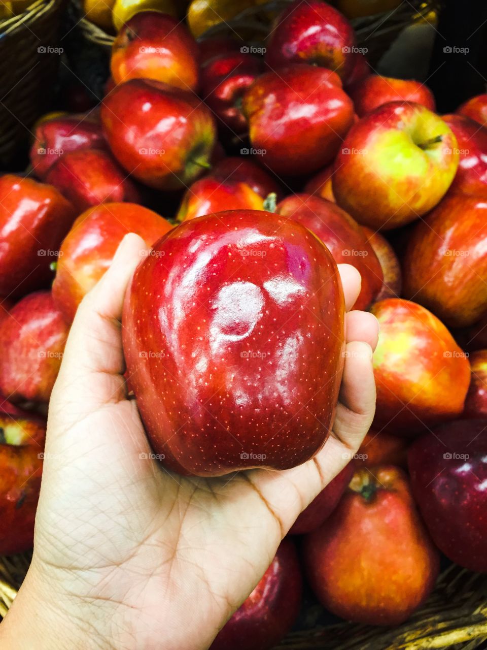 Apple on human's hand