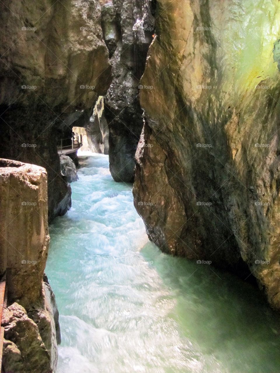 Stream flowing through canyon