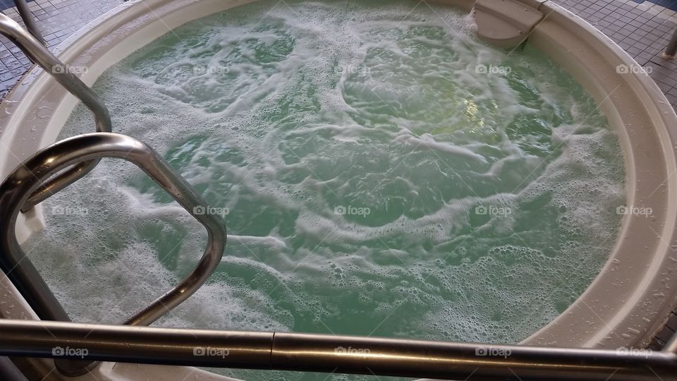swirling hot tub