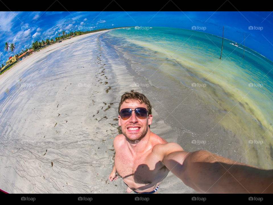 Man in island selfie paradise
