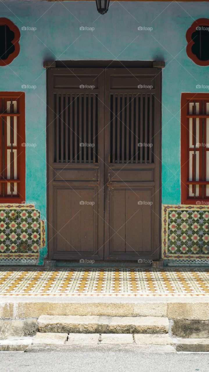 Patterned doorway on the streets of penang, malaysia