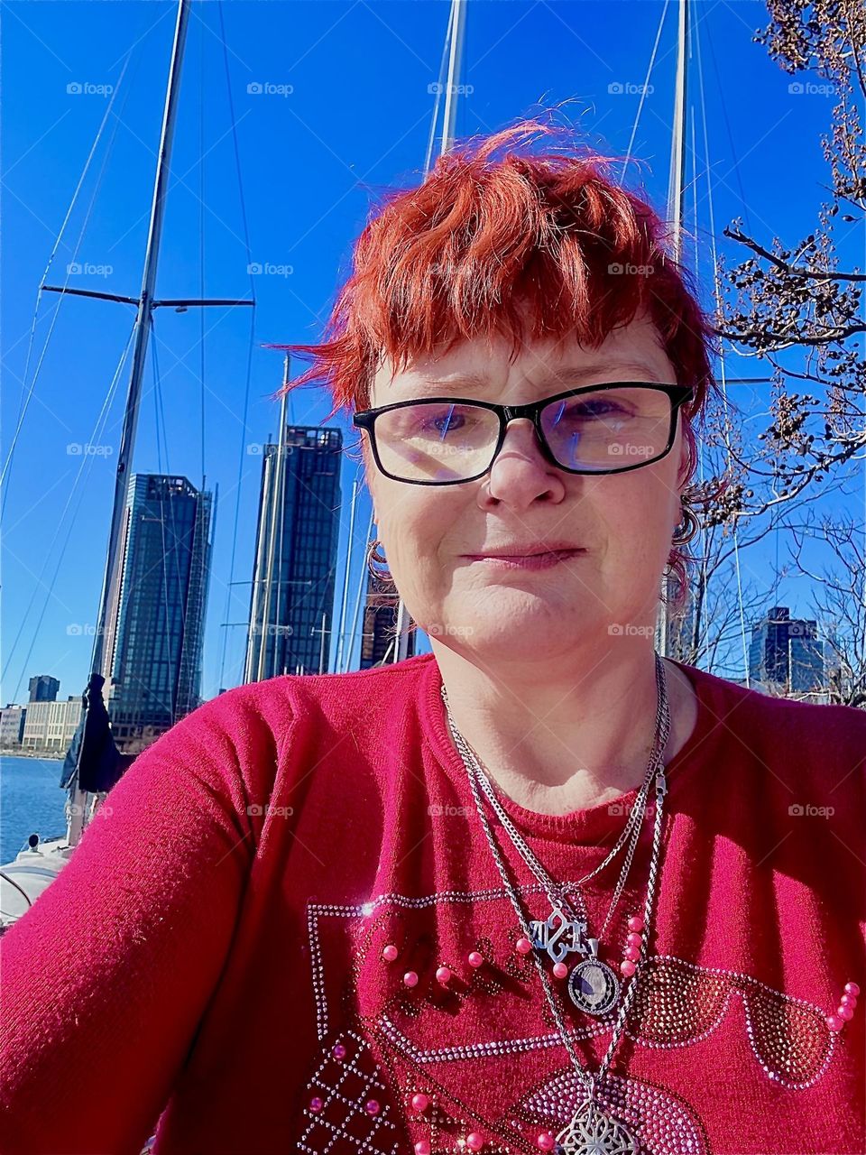 This is me, “Petra Schiller” a.k.a. “Maxine Firefox” a.k.a. “Maximiliane Feuerfuchs” outside on the front deck of “Salvation” at “Newtown Creek” by the “Pulaski Bridge” in LIC, Queens, our “28 ft 1969 Luhrs” cabin cruiser. 2024. Hypnotic Productions