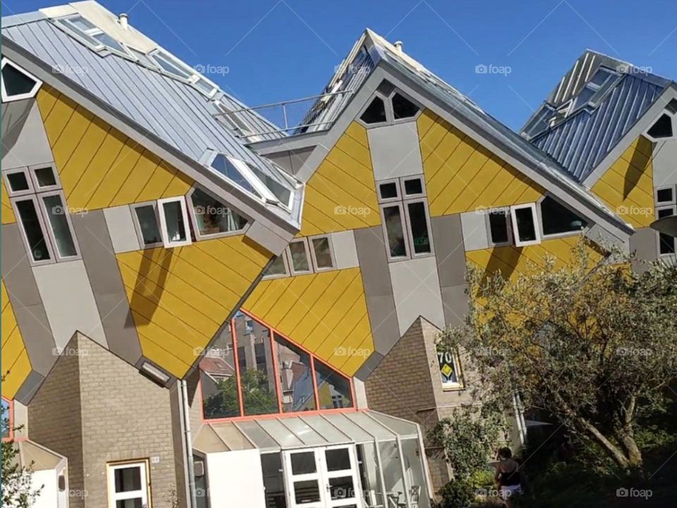 Architecture,Cube Houses in Rotterdam.Rotterdam is a city of striking modern design buildings that are quite impressive. The most unique might be the Cube Houses in their playful yellow color near the new Market Hall. Architectural gems in the city.
