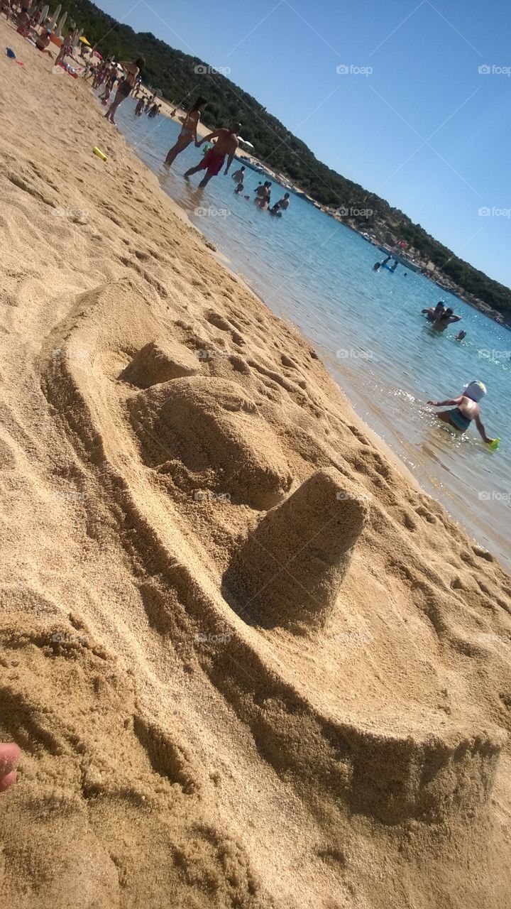 Sand sculpture on the beach. Kalamitsi beach, south Sithonia, Greece