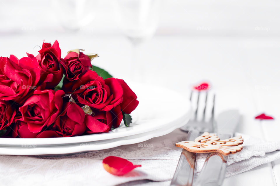 Red roses on a plate