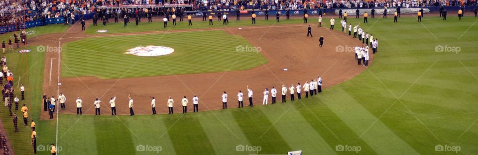 Mets greats circle the infield for the closing ceremonies after the final mets game at Shea stadium 