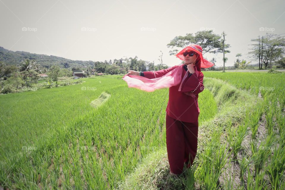 woman standing in field