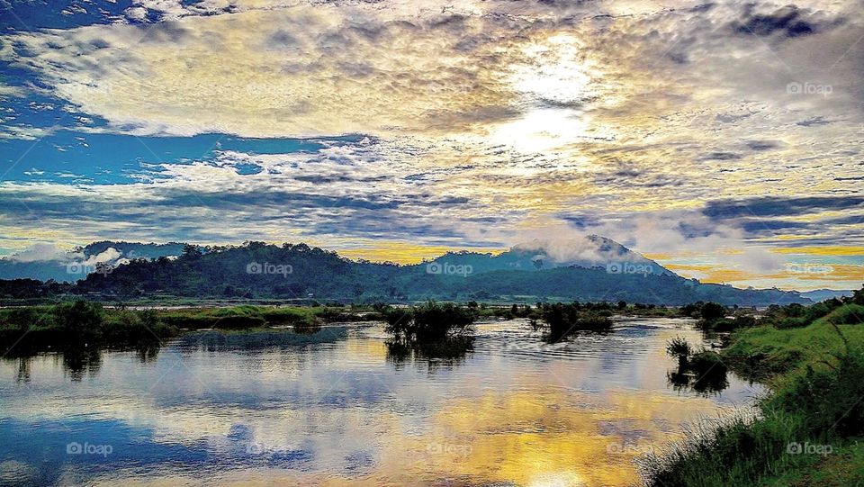 Sunset over the Mekong River between Laos and Thailand.