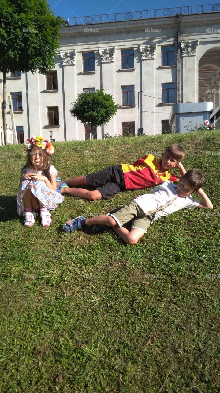 kids on green grass