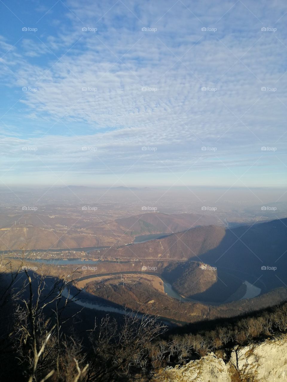 View from the top of the mountain to the valley and river