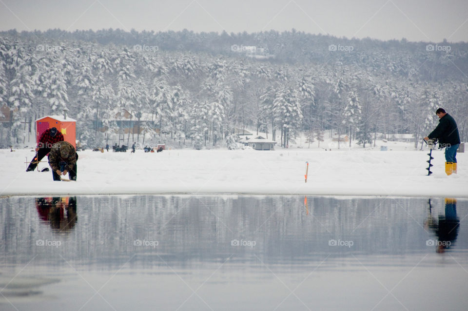 Ice fishing on Lake Winnepesaukee at the great rotary fishing derby