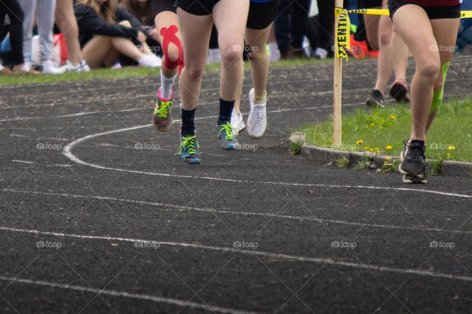People running in a track race