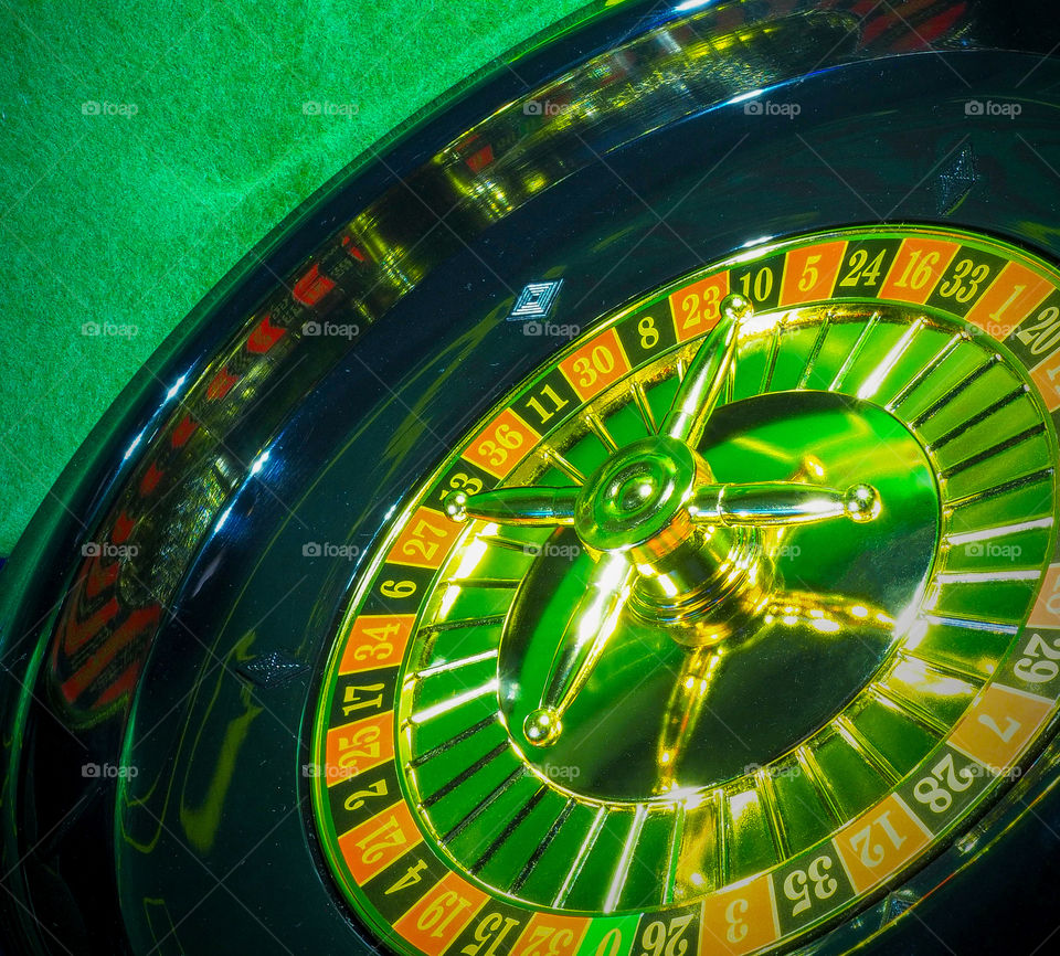 Disc gambling roulette on a dark background in bright colors