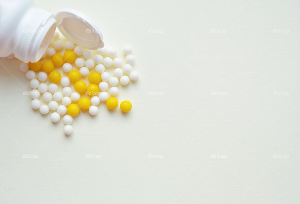 vitamins in the bank round beautiful texture on a white top view background