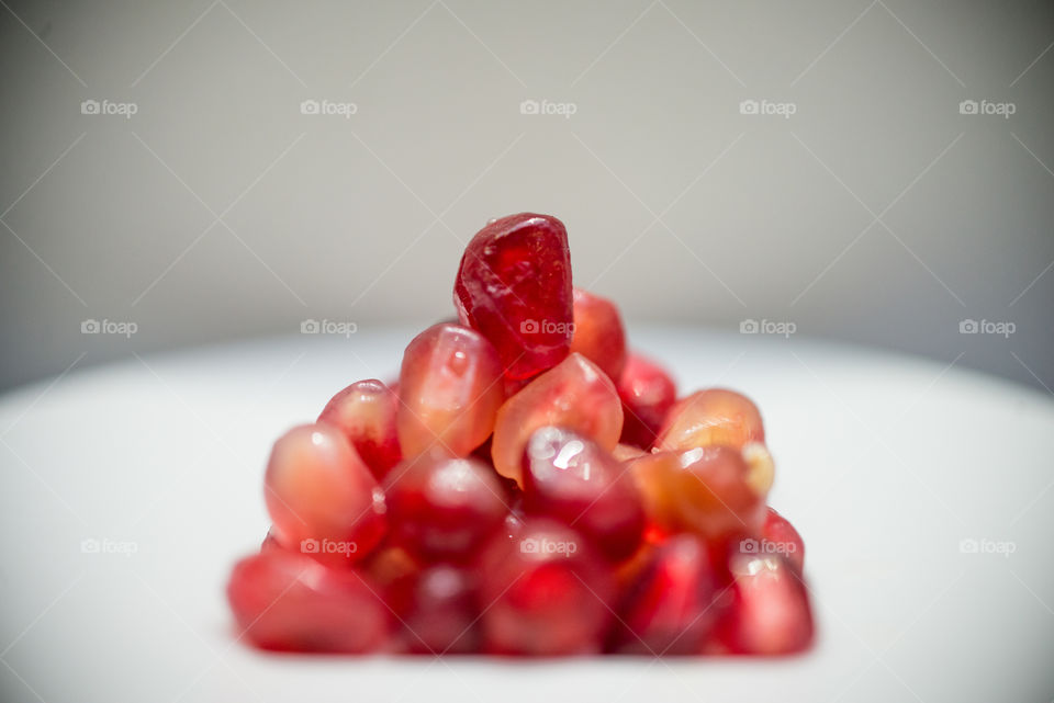 a pyramid of pomegranate pearls