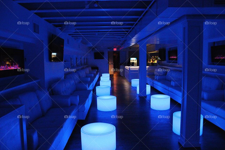 Nightclub vibes with a blue glow.