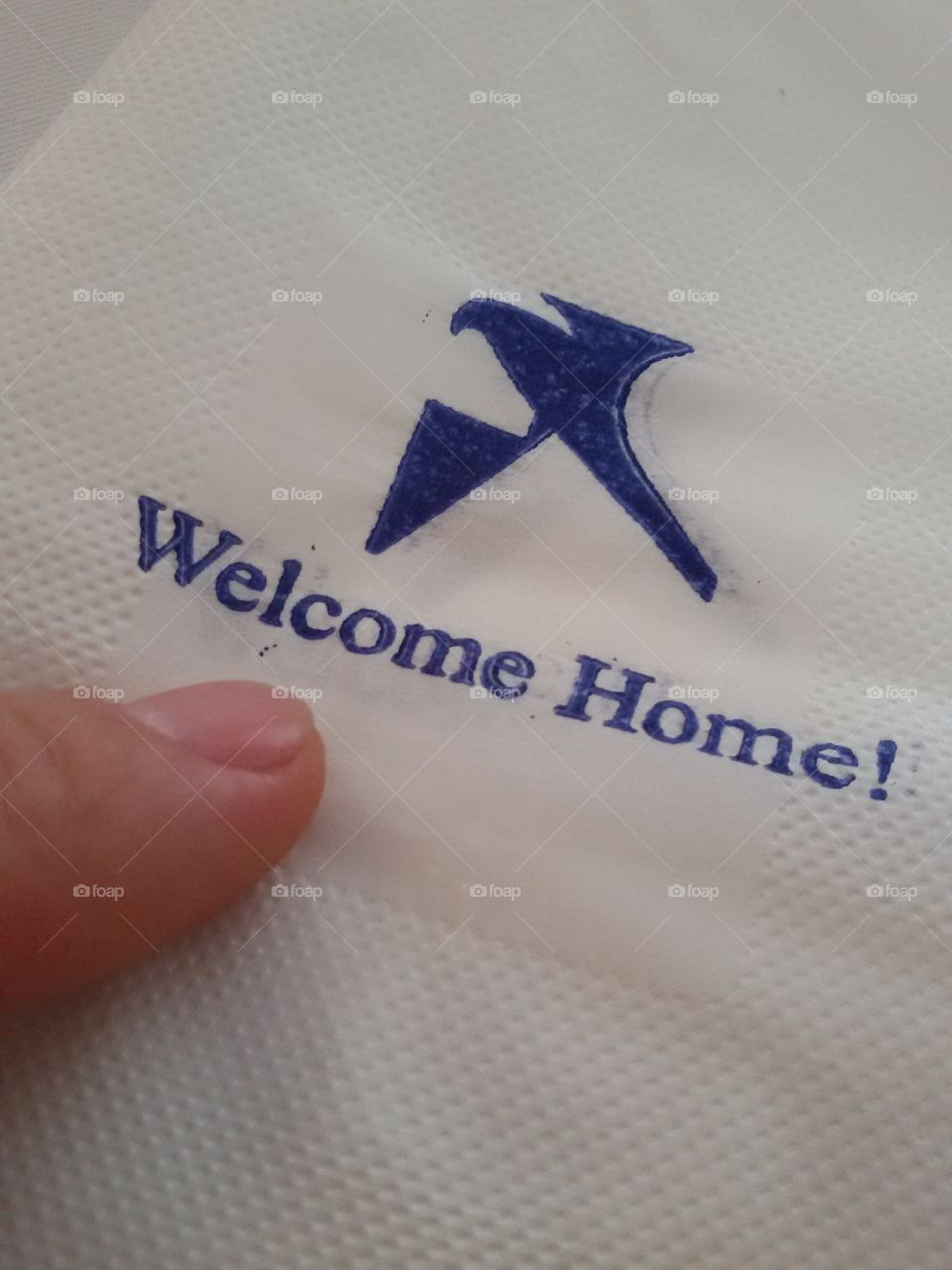 welcome home hotel napkin