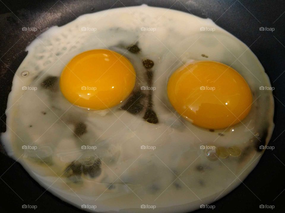 frying eggs