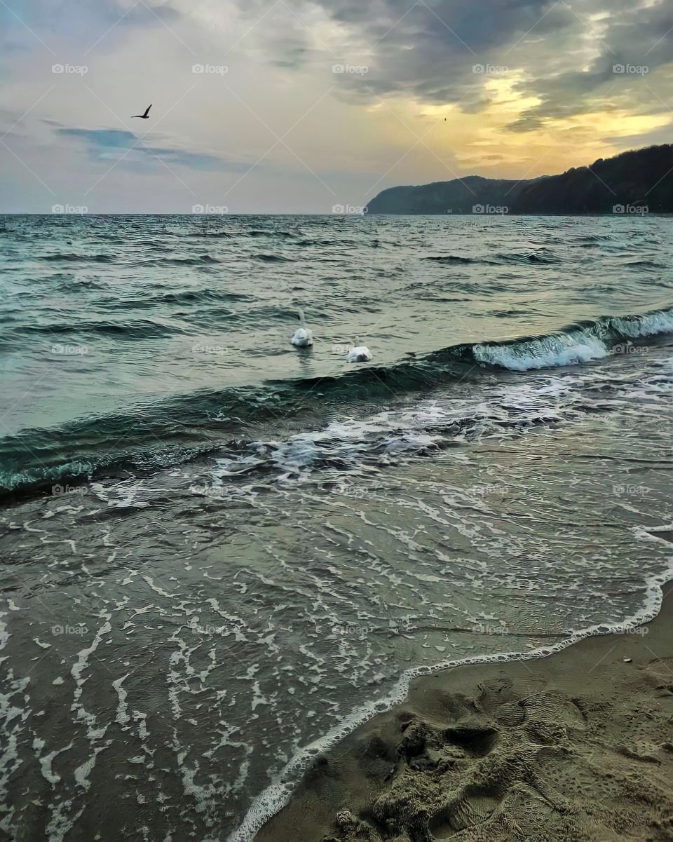 Colorful sky and deep blue sea
