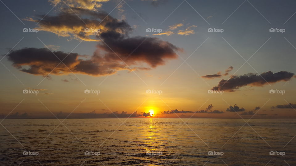 Sun reflecting in the sea at sunset