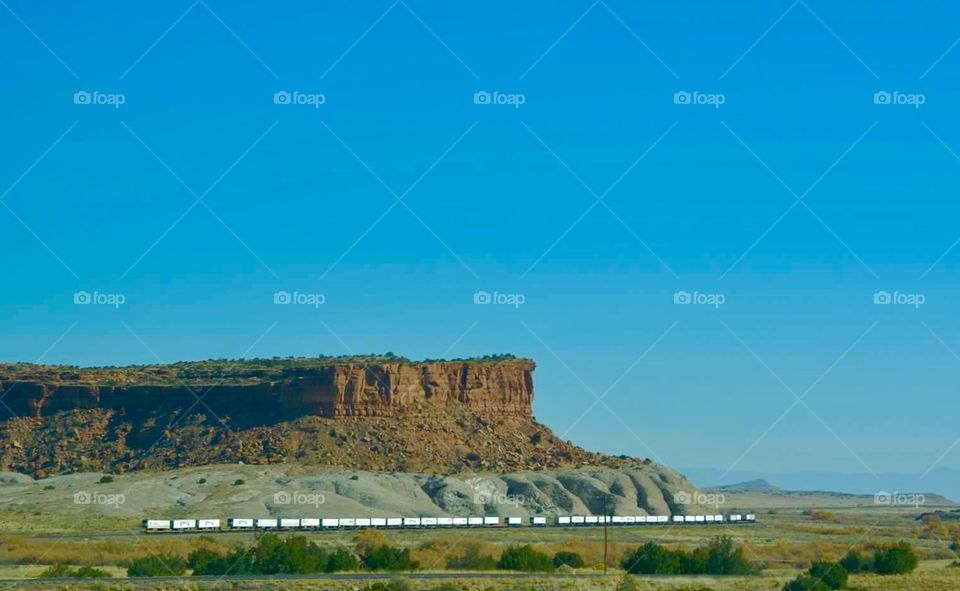 Train along the desert