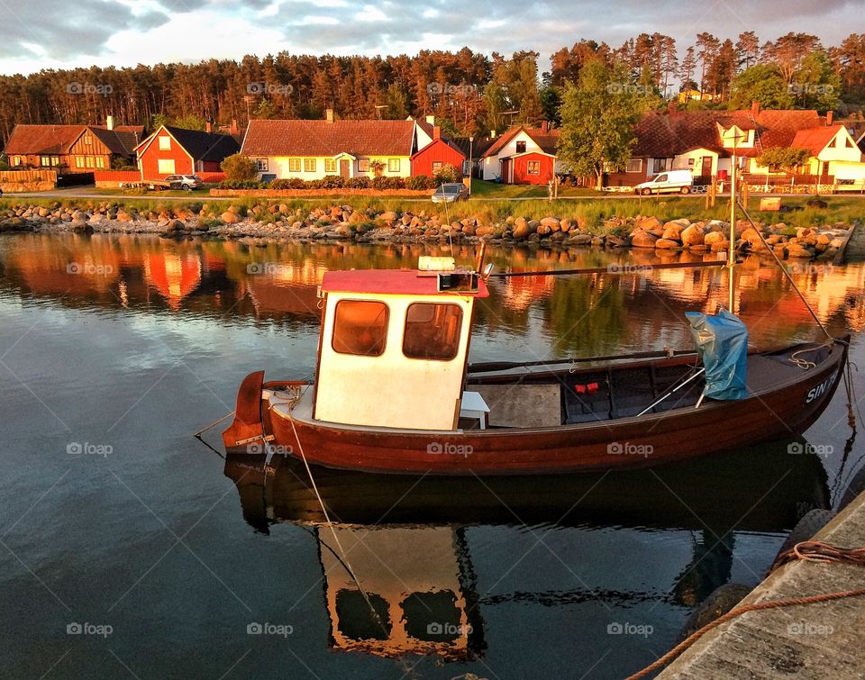 Fishing boat in reflection 