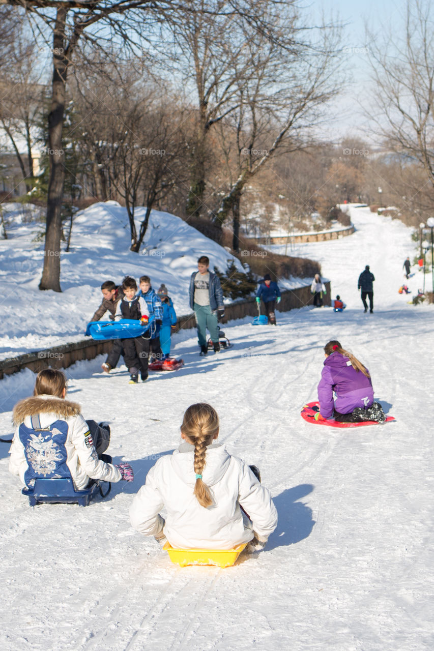 girls sliding