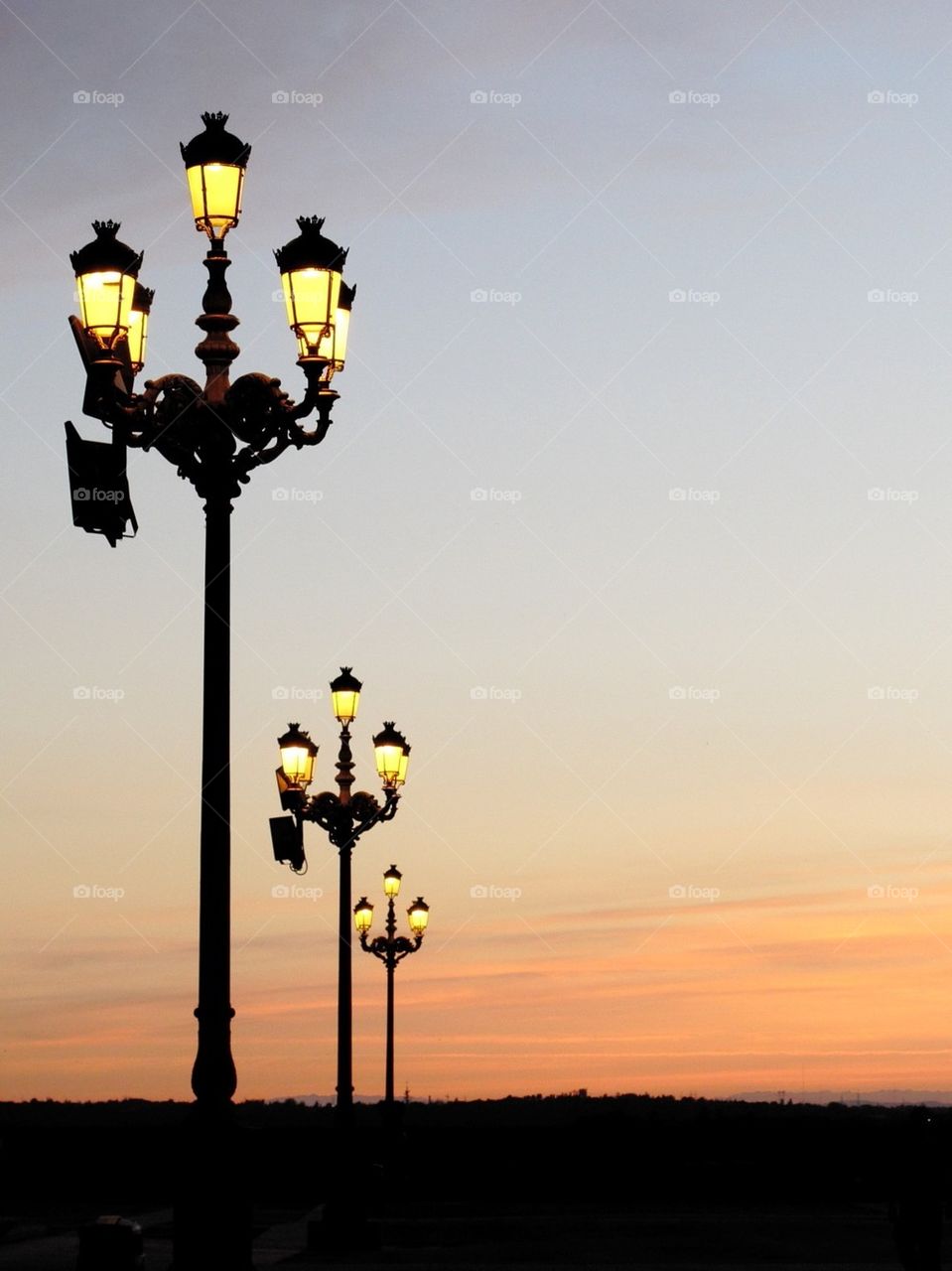 Three lamp posts 