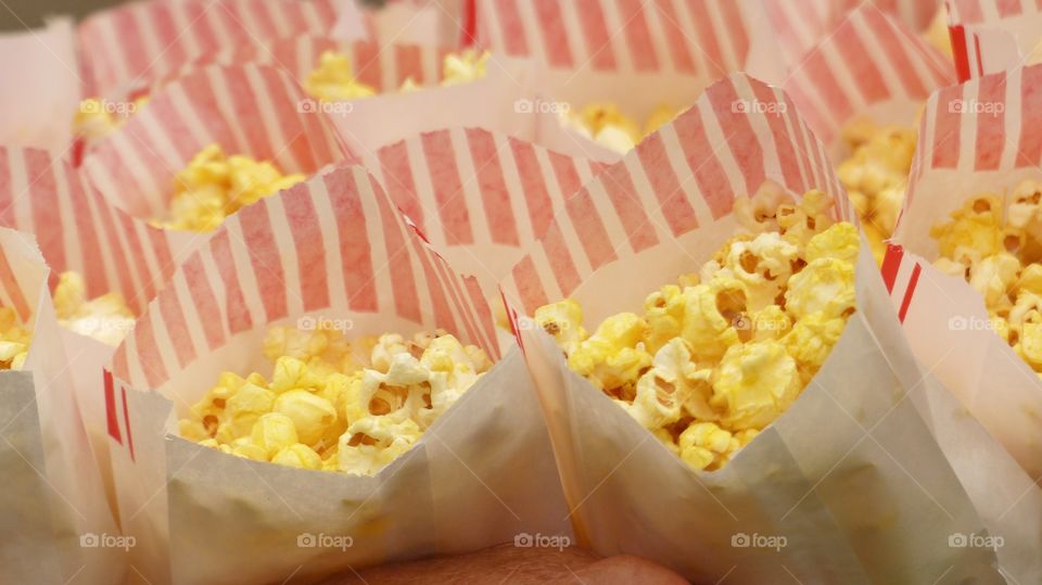 Popcorn in red and white bags