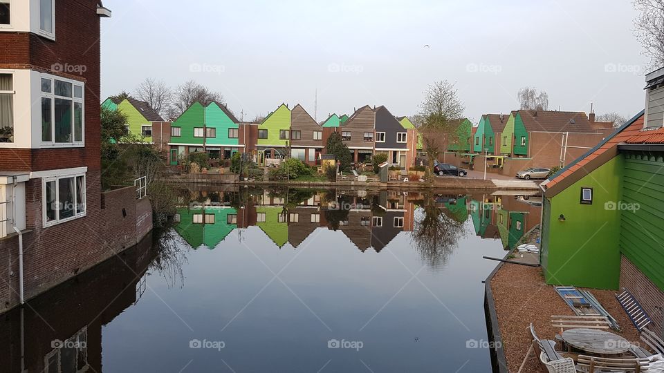 Houses reflected in Canal