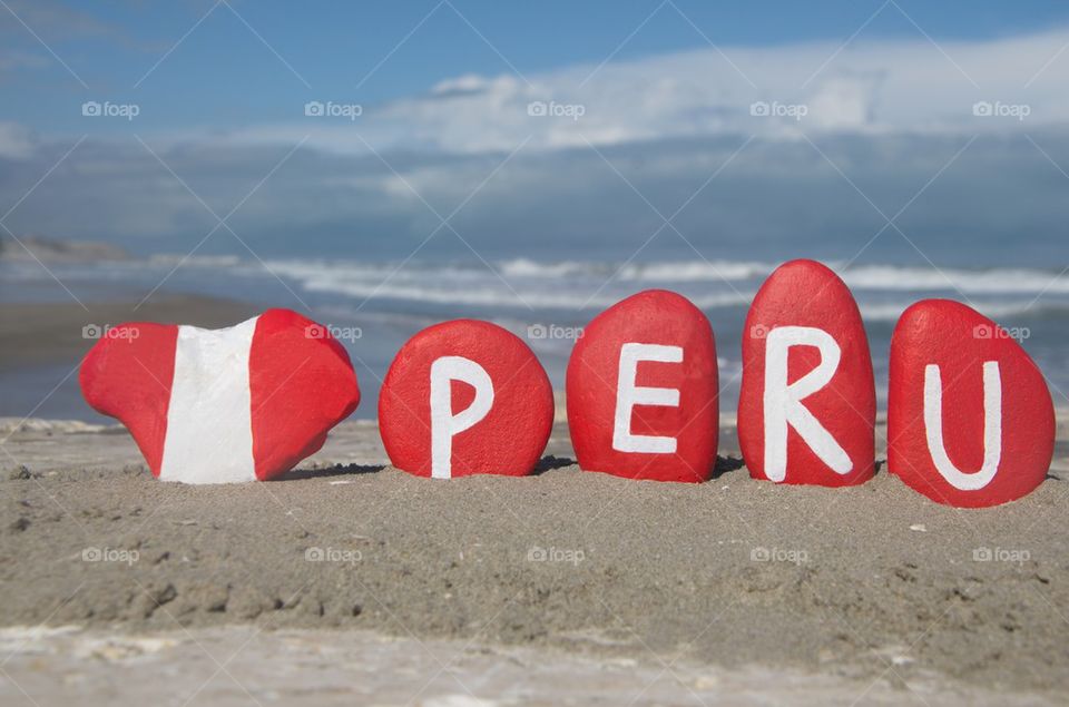 Peru, souvenir on stones with national flag