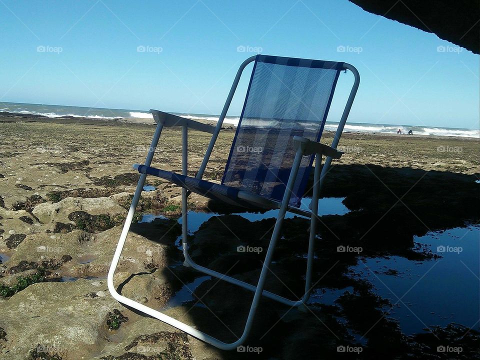 Beautiful chair near the sea at essaouira city in Morocco