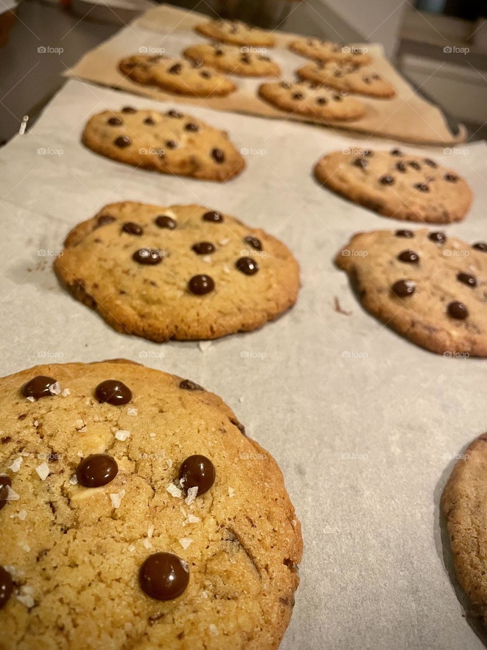 Chocolate chip cookies newly made. The amazing smell and crunchy first bite makes you want more than 1.
