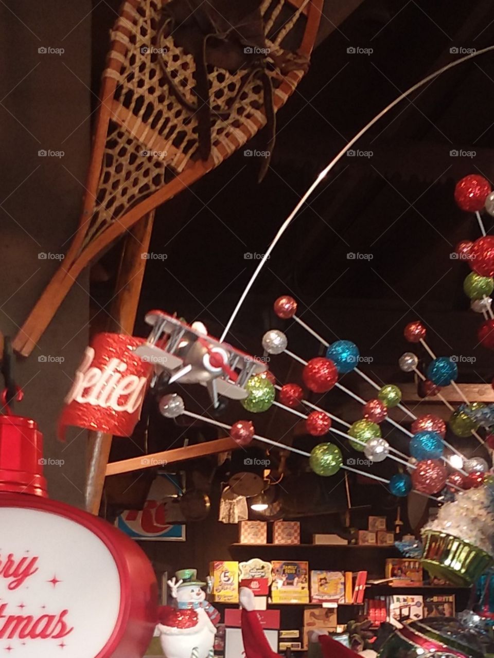 this airplane is pulling a banner around the Christmas tree from point A to point B a banner that says believe is pulled by airplane